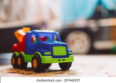 Colorful Plastic Toy Truck On Floor Home