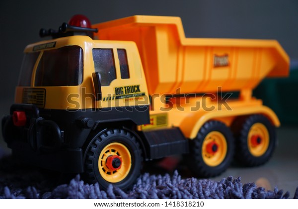 big plastic toy trucks