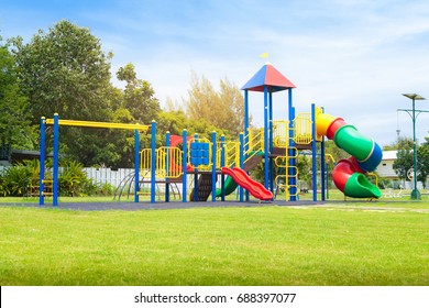 Colorful playground on yard in the park. - Shutterstock ID 688397077