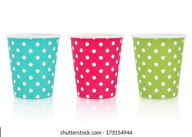 Colorful polka dot paper cups isolated on white.  - Powered by Shutterstock