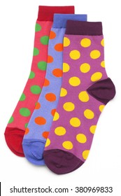 Colorful Polka Dot Socks On White Background