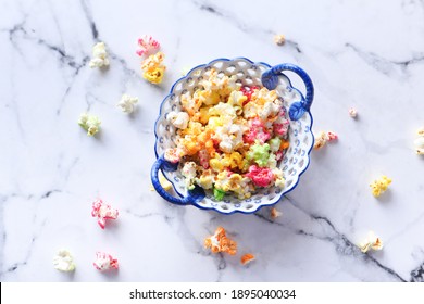  Colorful Popcorn In A Bowl On Tiles Background Top Down 