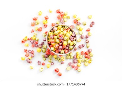 Colorful Popcorn In Bowl On White Desk From Above