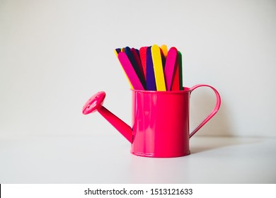 The Colorful Popsicle Stick In Pink Watering Can