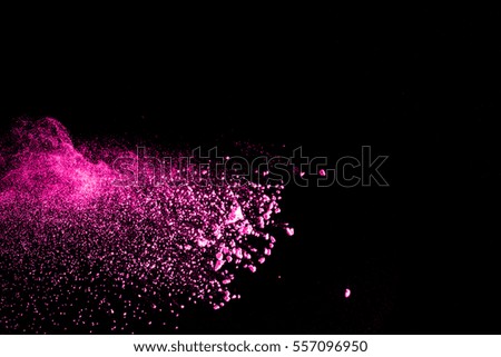 Colorful  powder explode on black background.