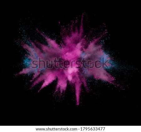 Colorful powder explosion isolated on black background, abstract background