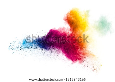 Colorful powder explosion on white background.Pastel color dust particle splashing.