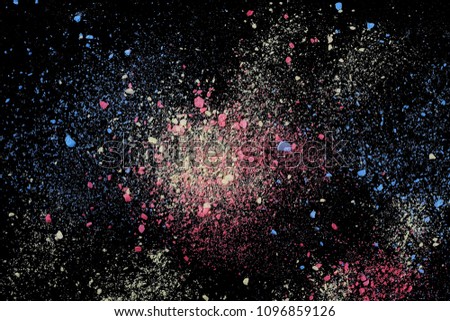 Colorful powder, isolated on black background, texture with clipping path