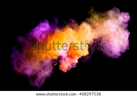 Colorful powders on black background