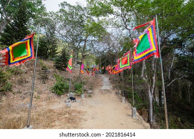 Colorful Prayer Flags On The Trail Hill To The Ta Cu Mountain Park, Ham Thuan Nam District, Vietnam. The Temple Complex 160km East Of Saigon Or Ho Chi Ming City. Cable Car Goes Up To The Mountain Peak