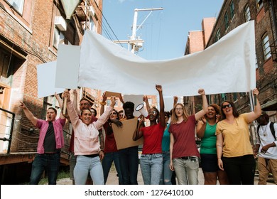 Colorful Protesters Marching Through A City