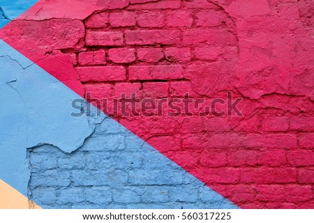 Colorful (purple, blue and beige) brick wall as background, texture