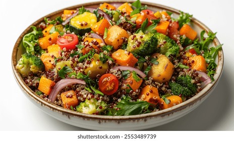 A colorful quinoa and roasted vegetable salad in a ceramic bowl, showcasing fresh and healthy plant-based ingredients