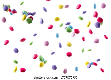 Colorful raibow candy falling on white bachhround