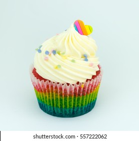 Colorful Rainbow Cupcake On White Background.