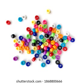 Colorful Rainbow Plastic Beads On White Background.  Kid's DIY Craft. Children's Necklace Beads