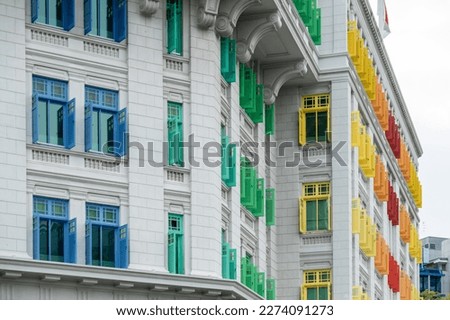 Colorful rainbow window of the Old Hill Street Police Station near Clarke Quay, Singapore.