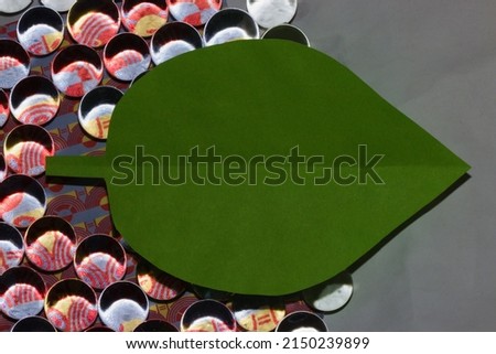 colorful retro wallpaper with glass balls in the middle green leaf as copy space, modern retro style, ecology concept