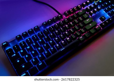 Colorful RGB Gaming Keyboard on Desk – Close-Up Qwerty