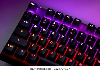 Colorful RGB Gaming Keyboard on Desk – Close-Up Qwerty