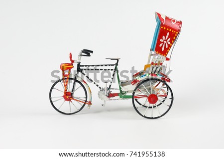 Colorful rickshaw toy model trishaw transport tricycle 
