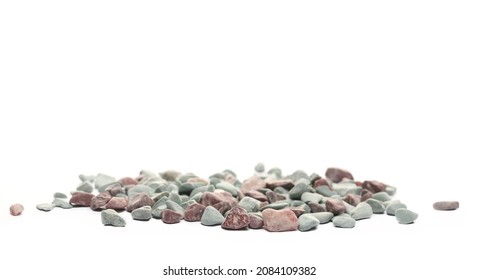 Colorful rocks, pebbles, stones pile isolated on white background, side view