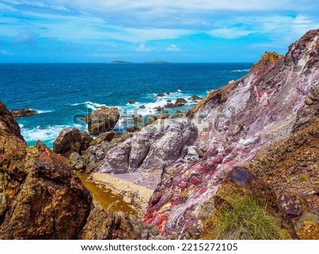 A Colorful Rocky Outcropping on Cas Cay looking out to the Caribbean sea on St Thomas Virgin Islands Imagine de stoc © 