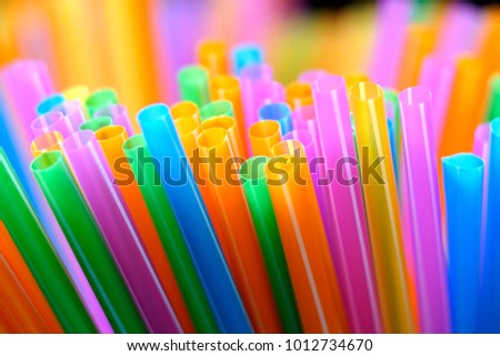 Colorful rod of straw with mixed color background
