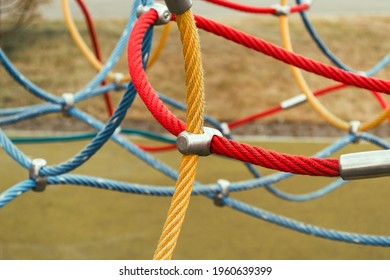 Colorful ropes on the sports ground. Connections of rope ropes for training. - Powered by Shutterstock