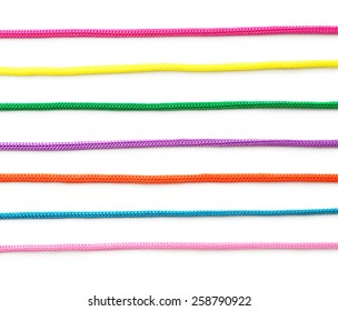 Colorful ropes on white background