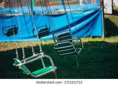 Colorful Rotating Chair Swing Ride At The Local Amusement Park