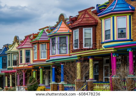 Colorful row houses along Guilford Avenue in Charles Village, Baltimore, Maryland.