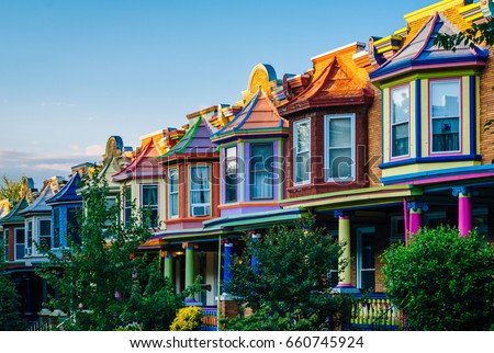 Colorful row houses on Guilford Avenue, in Charles Village, Baltimore, Maryland.