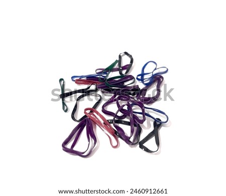 Colorful rubber bands in isolated white background.