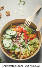 Colorful Salad With Vegetables In Plastic Free Delivery Food Container: Cucumber, Pepper, Salad, Chickpeas And Nuts. Sustainable Lifestyle With Healthy Vegan Food. Top View.