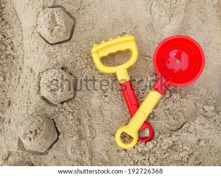 colorful sand castle toys on beach