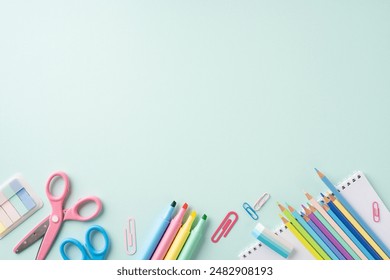 Colorful school stationery supplies arranged on a pastel background. Ideal for back to school themes or educational materials - Powered by Shutterstock