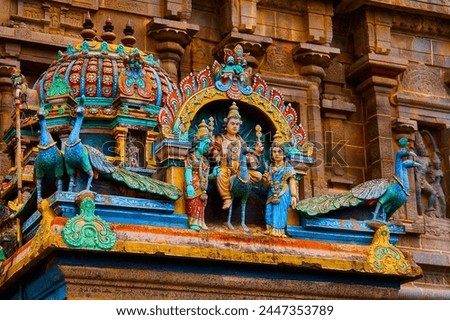colorful sculptures and statues in Dravidian style on a Hindu temple                              