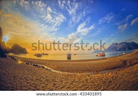 Colorful sea beach sunrise. Panoramic Olympos Beach, Cirali, Turkey