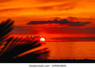Colorful sea sunset against clouds - Shutterstock ID 1990924835
