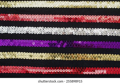 Colorful Sequins Striped Background Sparkly Red Gold Silver Purple Stripes Pattern On Colorful Sequins Striped Background Sparkly Red Gold Silver Purple Stripes Pattern On