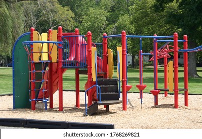 A colorful set of bars in an empty playground