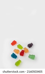 Colorful set of CBD infused medicinal candy gummies used for healing on a plain white background
