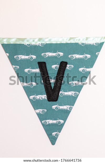 Colorful sewn triangle flag with letter for\
word combinations