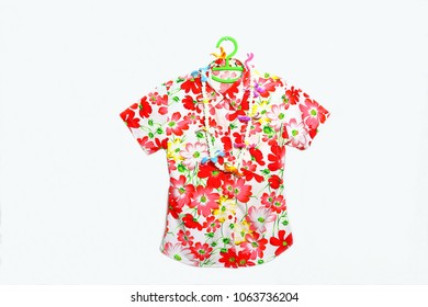 Colorful Shirt And Garland Hanging On Coat Hanger Prepare For Welcome Funny Season,Symbolic Of Thailand Songkran Festival Or Water Festival In South East Asia Region Isolated On White Background