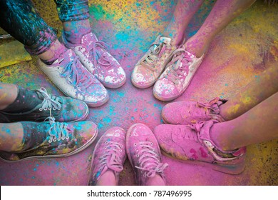 The Colorful Shoes And Legs Of Teenagers At Color Run Event