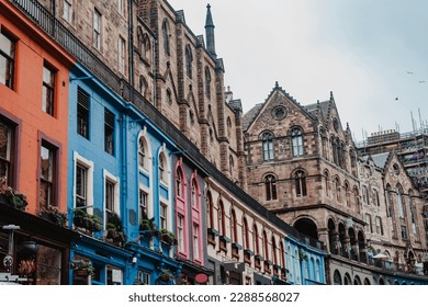 Colorful shop fronts on the famous Victoria Street in Edinburgh's Old Town