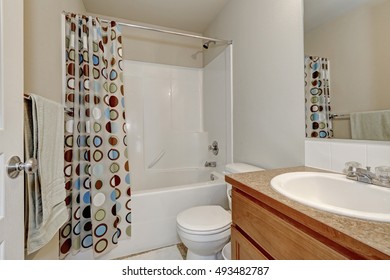 Colorful Shower Curtain In White Bathroom Interior. Northwest, USA