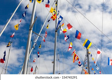 Colorful Signal Flags On A Sailing Boat In Sunshine