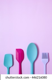 Colorful Silicone Baking Utensils On A Pink Background Forming A Cooking Themed A Page Border